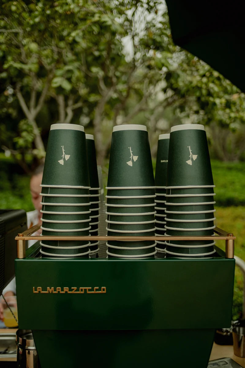 The original green Pad One coffee cups